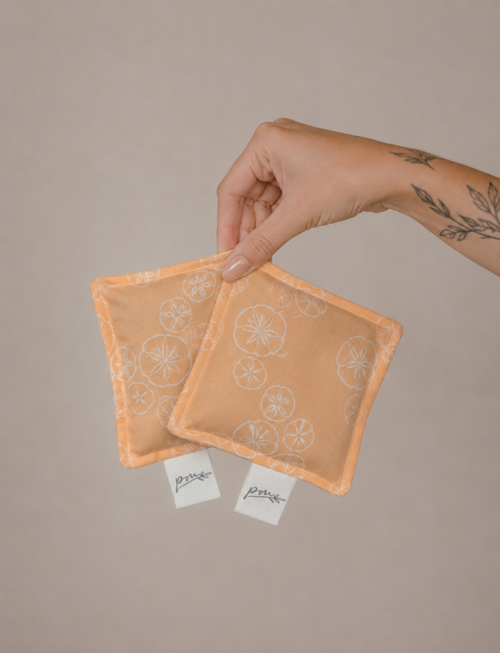 Treasures square weighted sensory fidgets with peach sand dollar print, set of two